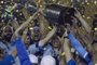  

Brazils Gremio footballers celebrate with the trophy after winning the Copa Libertadores 2017 final football match against Argentinas Lanus at Lanus stadium in Lanus, Buenos Aires, Argentina, on November 29, 2017. 
Gremio won 2-1 to become the champion of the Copa Libertadores 2017. / AFP PHOTO / JUAN MABROMATA

Editoria: SPO
Local: Buenos Aires
Indexador: JUAN MABROMATA
Secao: soccer
Fonte: AFP
Fotógrafo: STF