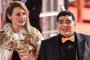 Argentine football legend Diego Maradona and his girlfriend Rocio Oliva arrive to attend the Final Draw for the 2018 FIFA World Cup football tournament at the State Kremlin Palace in Moscow on December 01, 2017. / AFP PHOTO / Kirill KUDRYAVTSEV