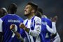 Porto's Brazilian defender Alex Telles celebrates after scoring a goal during their UEFA Champions League group G football match FC Porto vs Monaco at the Dragao stadium in Porto, on December 6, 2017. / AFP PHOTO / MIGUEL RIOPA