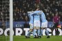 Manchester Citys Portuguese midfielder Bernardo Silva (L) celebrates with his team-mates after scoring the opening goal during the English League Cup quarter-final football match between Leicester City and Manchester City at King Power Stadium in Leicester, central England on December 19, 2017. / AFP PHOTO / Paul ELLIS / RESTRICTED TO EDITORIAL USE. No use with unauthorized audio, video, data, fixture lists, club/league logos or live services. Online in-match use limited to 75 images, no video emulation. No use in betting, games or single club/league/player publications.  / 