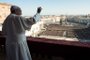 This handout picture released by the Vatican press office shows Pope Francis waves from the balcony of St Peter's basilica during the traditional "Urbi et Orbi" Christmas message to the city and the world, on December 25, 2017 at St Peter's square in Vatican.  Handout / OSSERVATORE ROMANO / AFP