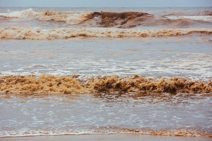 Praia Da Maré Baixa Na Baía De Fundy Novo Brunswick - a água De Cor  Castanha De Canadá Chamou O Rio Do Chocolate Foto de Stock - Imagem de  liso, dinâmico: 101530346
