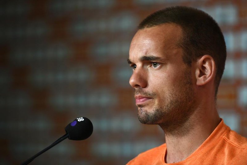  Netherlands midfielder Wesley Sneijder gives a press conference at The Flamenco Football Stadium in Rio de Janeiro on June 30, 2014, during the 2014 FIFA World Cup.   AFP PHOTO / YASUYOSHI CHIBAEditoria: SPOLocal: Rio de JaneiroIndexador: YASUYOSHI CHIBASecao: sports eventFonte: AFPFotógrafo: STF