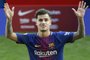 Barcelonas new Brazilian midfielder Philippe Coutinho poses with his new jersey during his official presentation in Barcelona on January 8, 2018. Philippe Coutinho officially joined Barcelona today, completing a move from Liverpool thought to be worth 160 million euros ($192 million), making it the third richest transfer in history. / AFP PHOTO / LLUIS GENE