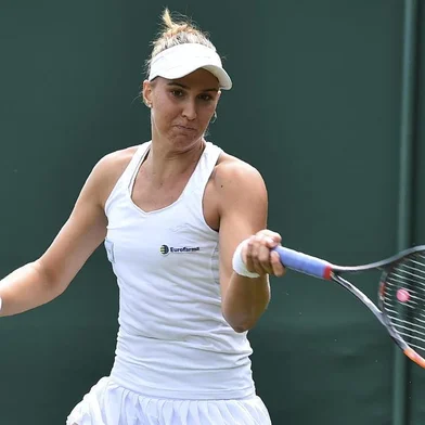 Brazil's Beatriz Haddad Maia returns against Britain's Laura Robson during their women's singles first round match on the first day of the 2017 Wimbledon Championships at The All England Lawn Tennis Club in Wimbledon, southwest London, on July 3, 2017. / AFP PHOTO / Glyn KIRK / RESTRICTED TO EDITORIAL USE