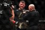 BOSTON, MA - JANUARY 20: Stipe Miocic speaks to Joe Rogan after defeating Francis Ngannou in their Heavyweight Championship fight during UFC 220 at TD Garden on January 20, 2018 in Boston, Massachusetts.   Mike Lawrie/Getty Images/AFP