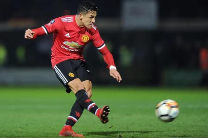 Manchester Uniteds Chilean striker Alexis Sanchez takes a shot at goal during the FA Cup fourth round football match between Yeovil Town and Manchester United at Huish Park in Yeovil, Somerset on January 26, 2018. / AFP PHOTO / - / RESTRICTED TO EDITORIAL USE. No use with unauthorized audio, video, data, fixture lists, club/league logos or live services. Online in-match use limited to 75 images, no video emulation. No use in betting, games or single club/league/player publications.  / 