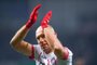 Bayern Munichs Dutch midfielder Arjen Robben celebrates at the end of the German football Cup DFB Pokal quarter-final match SC Paderborn versus Bayern Munich on February 6, 2018 in Paderborn. Bayern Munich won 6-0. / AFP PHOTO / Patrik STOLLARZ / RESTRICTIONS: ACCORDING TO DFB RULES IMAGE SEQUENCES TO SIMULATE VIDEO IS NOT ALLOWED DURING MATCH TIME. MOBILE (MMS) USE IS NOT ALLOWED DURING AND FOR FURTHER TWO HOURS AFTER THE MATCH. == RESTRICTED TO EDITORIAL USE == FOR MORE INFORMATION CONTACT DFB DIRECTLY AT +49 69 67880 / 