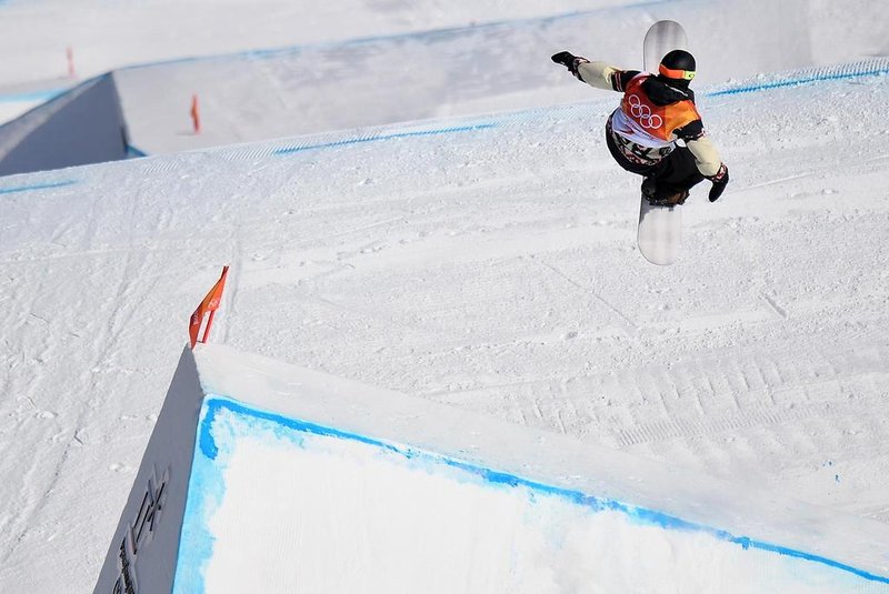 Canadas Mark McMorris competes in a run during the final of the mens snowboard slopestyle at the Phoenix Park during the Pyeongchang 2018 Winter Olympic Games on February 11, 2018 in Pyeongchang.  / AFP PHOTO / LOIC VENANCE