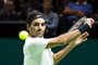 Roger Federer of Switzerland plays a backhand return to Philipp Kohlschreiber of Germany during their second round singles match for the ABN AMRO World Tennis Tournament in Rotterdam on February 15, 2018.  / AFP PHOTO / ANP / Koen Suyk / Netherlands OUT
