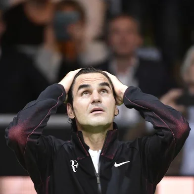Switzerlands Roger Federer gestures as he celebrates after victory over Netherlands Robin Haase in their quarter-final singles tennis match for the ABN AMRO World Tennis Tournament in Rotterdam on February 16, 2018.  / AFP PHOTO / John THYS