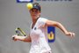 A tenista americana Elizabeth Mandlik em jogo da categoria 18 anos do Campeonato Internacional Juvenil de Tênis de Porto Alegre, disputado nas quadras de saibro da Associação Leopoldina Juvenil, em Porto Alegre.