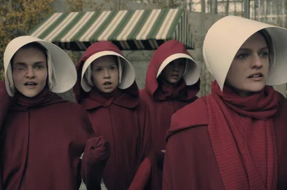The Handmaids Tale  -- Faithful -- Episode 105 --  Serena Joy makes Offred a surprising proposition. Offred remembers the unconventional beginnings of her relationship with her husband. Janine (Madeline Brewer), left and Offred (Elisabeth Moss), right, shown. (Photo by: George Kraychyk/Hulu)