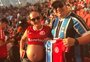 Presente em todos os clássicos de torcida mista, casal espera "bebê Gre-Nal"