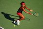 KEY BISCAYNE, FL - MARCH 21: Naomi Osaka of Japan plays a backhand against Serena Williams of the United States in their first round match during the Miami Open Presented by Itau at Crandon Park Tennis Center on March 21, 2018 in Key Biscayne, Florida.   Clive Brunskill/Getty Images/AFP