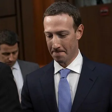 Facebook CEO Mark Zuckerberg Testifies At Joint Senate Commerce/Judiciary HearingWASHINGTON, DC - APRIL 10: Facebook co-founder, Chairman and CEO Mark Zuckerberg returns to the witness table after taking a brief break while testifying before a combined Senate Judiciary and Commerce committee hearing in the Hart Senate Office Building on Capitol Hill April 10, 2018 in Washington, DC. Zuckerberg, 33, was called to testify after it was reported that 87 million Facebook users had their personal information harvested by Cambridge Analytica, a British political consulting firm linked to the Trump campaign.   Alex Wong/Getty Images/AFPEditoria: POLLocal: WashingtonIndexador: ALEX WONGSecao: GovernmentFonte: GETTY IMAGES NORTH AMERICAFotógrafo: STF