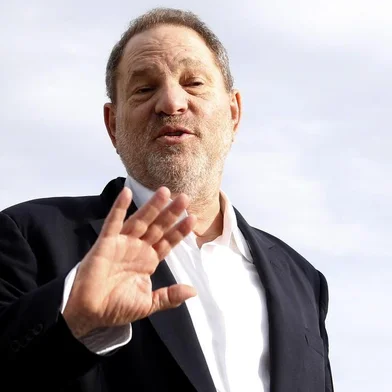(FILES) This file photo taken on October 5, 2015 shows Harvey Weinstein, US film producer and executive producer of the TV series War and Peace, posing during a photocall at the MIPCOM audiovisual trade fair in Cannes, southeastern France.New York police said on October 12, 2017 they have reopened a investigation into allegations of a 2004 sexual assault by disgraced movie mogul Harvey Weinstein. An avalanche of claims of sexual harassment, assault and rape by the Hollywood heavyweight have surfaced since the publication last week of an explosive New York Times report alleging a history of abusive behavior dating back decades. / AFP PHOTO / VALERY HACHE