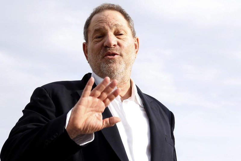 (FILES) This file photo taken on October 5, 2015 shows Harvey Weinstein, US film producer and executive producer of the TV series War and Peace, posing during a photocall at the MIPCOM audiovisual trade fair in Cannes, southeastern France.New York police said on October 12, 2017 they have reopened a investigation into allegations of a 2004 sexual assault by disgraced movie mogul Harvey Weinstein. An avalanche of claims of sexual harassment, assault and rape by the Hollywood heavyweight have surfaced since the publication last week of an explosive New York Times report alleging a history of abusive behavior dating back decades. / AFP PHOTO / VALERY HACHE