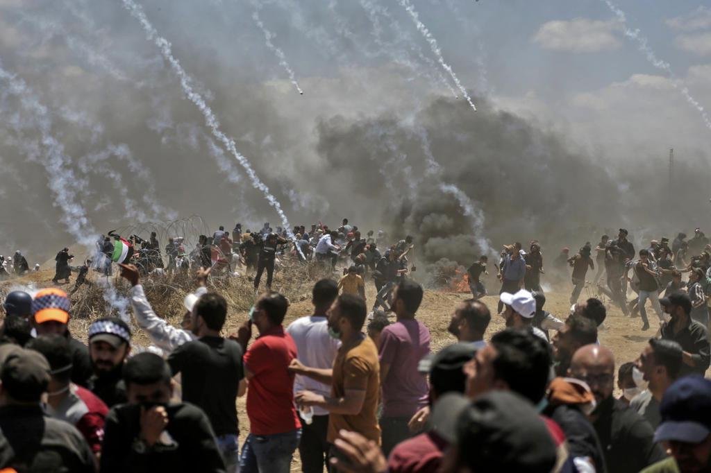 Resultado de imagem para onda de protestos onde mais de 50 pessoas morrem na Faixa de Gaza