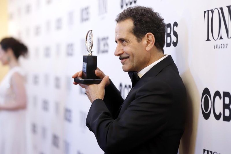 NEW YORK, NY - JUNE 10: Tony Shalhoub, winner of the award for Best Performance by an Actor in a Leading Role in a Musical for The Bands Visit, poses in the 72nd Annual Tony Awards Media Room at 3 West Club on June 10, 2018 in New York City.   Jemal Countess/Getty Images for Tony Awards Productions/AFP