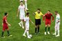  Portugals forward Cristiano Ronaldo (2ndR) reacts next to Spains defender Sergio Ramos (R) and Italian referee Gianluca Rocchi during the Russia 2018 World Cup Group B football match between Portugal and Spain at the Fisht Stadium in Sochi on June 15, 2018. / AFP PHOTO / Jonathan NACKSTRAND / RESTRICTED TO EDITORIAL USE - NO MOBILE PUSH ALERTS/DOWNLOADSEditoria: SPOLocal: SochiIndexador: JONATHAN NACKSTRANDSecao: soccerFonte: AFPFotógrafo: STR