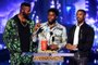 2018 MTV Movie And TV Awards - ShowSANTA MONICA, CA - JUNE 16: (L-R) Actors Winston Duke, Chadwick Boseman, and Michael B. Jordan accept the Best Movie award (Presented by Toyota) for Black Panther onstage during the 2018 MTV Movie And TV Awards at Barker Hangar on June 16, 2018 in Santa Monica, California.   Kevin Winter/Getty Images for MTV/AFPEditoria: ACELocal: Santa MonicaIndexador: KEVIN WINTERSecao: PeopleFonte: GETTY IMAGES NORTH AMERICAFotógrafo: STF