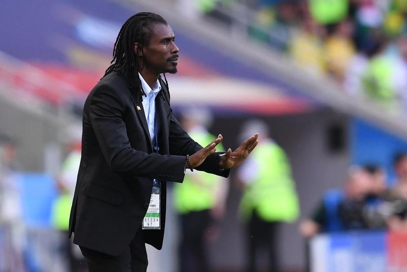 Senegal's coach Aliou Cisse gestures during the Russia 2018 World Cup Group H football match between Poland and Senegal at the Spartak Stadium in Moscow on June 19, 2018. / AFP PHOTO / Francisco LEONG / RESTRICTED TO EDITORIAL USE - NO MOBILE PUSH ALERTS/DOWNLOADS