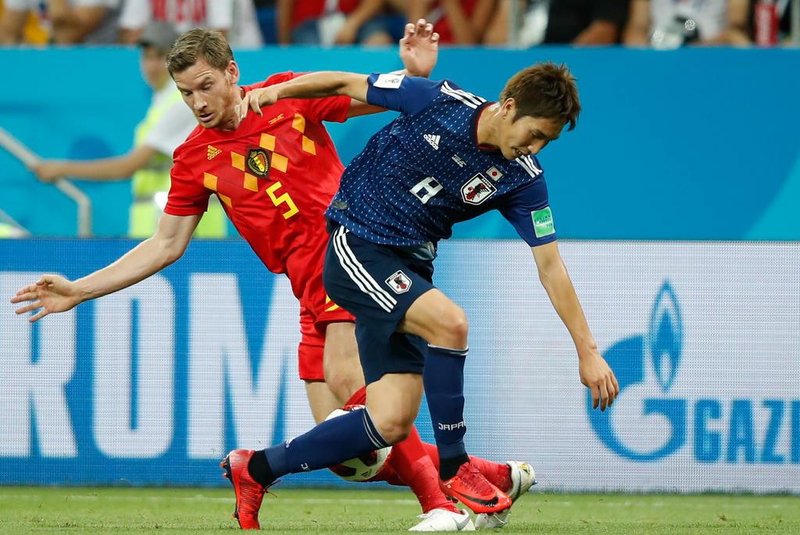 Belgiums defender Jan Vertonghen (L) vies with Japans forward Genki Haraguchi during the Russia 2018 World Cup round of 16 football match between Belgium and Japan at the Rostov Arena in Rostov-On-Don on July 2, 2018. / AFP PHOTO / Odd ANDERSEN / RESTRICTED TO EDITORIAL USE - NO MOBILE PUSH ALERTS/DOWNLOADS