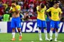 (L-R) Brazil's forward Roberto Firmino, Brazil's midfielder Fernandinho and Brazil's defender Fagner react after losing the Russia 2018 World Cup quarter-final football match between Brazil and Belgium at the Kazan Arena in Kazan on July 6, 2018. / AFP PHOTO / Luis Acosta / RESTRICTED TO EDITORIAL USE - NO MOBILE PUSH ALERTS/DOWNLOADS