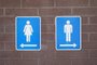 placa de sinalização de banheiro masculino e feminino