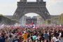 775191918France supporters cheer on the fan zone as they watch the Russia 2018 World Cup final football match between France and Croatia, on the Champ de Mars in Paris on July 15, 2018.  / AFP PHOTO / JACQUES DEMARTHONEditoria: SPOLocal: ParisIndexador: JACQUES DEMARTHONSecao: soccerFonte: AFPFotógrafo: STF