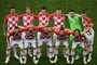 (front row from L to R) Croatias midfielder Marcelo Brozovic, Croatias defender Domagoj Vida, Croatias midfielder Ivan Rakitic, Croatias defender Sime Vrsaljko, Croatias midfielder Luka Modric (back row from L to R) Croatias defender Dejan Lovren, Croatias defender Ivan Strinic, Croatias forward Mario Mandzukic, Croatias forward Ante Rebic, Croatias goalkeeper Danijel Subasic and Croatias forward Ivan Perisic pose for team photo prior to the Russia 2018 World Cup final football match between France and Croatia at the Luzhniki Stadium in Moscow on July 15, 2018. / AFP PHOTO / GABRIEL BOUYS / RESTRICTED TO EDITORIAL USE - NO MOBILE PUSH ALERTS/DOWNLOADS