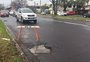 Buracos causam bloqueio parcial em uma das principais vias da zona norte de Porto Alegre