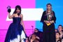 NEW YORK, NY - AUGUST 20: Camila Cabello accepts an award from Madonna onstage during the 2018 MTV Video Music Awards at Radio City Music Hall on August 20, 2018 in New York City.   Theo Wargo/Getty Images/AFP