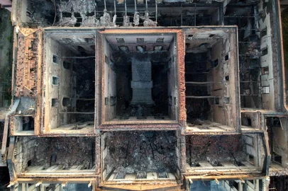 Drone view of Rio de Janeiro's treasured National Museum, one of Brazil's oldest, on September 3, 2018, a day after a massive fire ripped through the building. The majestic edifice stood engulfed in flames as plumes of smoke shot into the night sky, while firefighters battled to control the blaze that erupted around 2230 GMT. Five hours later they had managed to smother much of the inferno that had torn through hundreds of rooms, but were still working to extinguish it completely, according to an AFP photographer at the scene. / AFP PHOTO / Mauro Pimentel