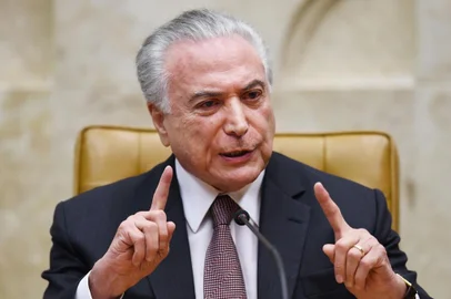  Brazilian President Michel Temer delivers a speech during a solemn session to mark the 30th anniversary of the 1988 Brazilian Constitution at the Supreme Court plenary, in Brasilia on October 4, 2018. / AFP PHOTO / EVARISTO SAEditoria: POLLocal: BrasíliaIndexador: EVARISTO SASecao: constitutionFonte: AFPFotógrafo: STF