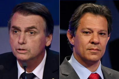  COMBO-FILES-BRAZIL-ELECTION-HADDAD-BOLSONAROData: 07/10/2018Palavras-chave: vote , election , Horizontal , COMBO PHOTO , bolsonaro , haddadDescrição: (COMBO) This combination of pictures created on October 07, 2018 shows a file photo taken on September 26, 2018 of Brazilian presidential candidate for the Workers Party (PT) Fernando Haddad (L) during the presidential debate at SBT television network in Osasco, Sao Paulo, and a file photo taken on August 09, 2018 of Brazilian presidential candidate Jair Bolsonaro (PSL), during the first presidential debate at Bandeirantes television network in Sao Paulo. Brazilians began casting ballots Sunday in their most divisive presidential election in years, with a far-right politician promising an iron-fisted crackdown on crime, Jair Bolsonaro, the firm favorite in the first round./ AFP PHOTO / NELSON ALMEIDA AND Nelson ALMEIDA Editoria: POL Local: Sao Paulo Indexador: NELSON ALMEIDA Secao: election Fonte: AFP Fotógrafo: STFFotógrafo: NELSON ALMEIDA AND Nelson ALMEIDAIndexador: Emerson_SouzaFonte: AFPPublicação Proibida: NãoNica Id: 13773724Empresa Proposta: Diário Catarinense OnlineTamanho: 3139164