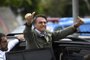  Jair Bolsonaro, far-right lawmaker and presidential candidate for the Social Liberal Party (PSL), gives thumbs up to supporters, during the second round of the presidential elections, in Rio de Janeiro, Brazil on October 28, 2018. - Brazilians will choose their president today during the second round of the national elections between the far-right firebrand Jair Bolsonaro and leftist Fernando Haddad (Photo by MAURO PIMENTEL / AFP)Editoria: POLLocal: Rio de JaneiroIndexador: MAURO PIMENTELSecao: electionFonte: AFPFotógrafo: STF