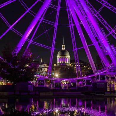 The dome of Bonsecours Market, as seen through Le Grande roue de Montreal, an observation wheel, in Old Montreal.UNDATED â BC-TRAVEL-TIMES-36-MONTREAL-ART-NYTSF â The dome of Bonsecours Market, as seen through Le Grande roue de Montreal, an observation wheel, in Old Montreal. Its cobblestone streets and French architecture make Old Montreal, the original settlement on the St. Lawrence Seaway, compelling. But the second largest city in Canada, now 376 years old, also has much to offer in its surrounding neighborhoods. From the new restaurants of Gay Village to the annually updated murals of the Plateau and the trendy shopping of Mile End, the cityâs districts make a strong case for buying a subway pass. (CREDIT: Christinne Muschi/The New York Times)âONLY FOR USE WITH ARTICLE SLUGGED -- BC-TRAVEL-TIMES-36-MONTREAL-ART-NYTSF -- OTHER USE PROHIBITED.Editoria: TRALocal: MONTREALIndexador: CHRISTINNE MUSCHIFonte: NYTNSFotógrafo: STR