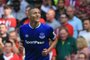 Evertons Brazilian striker Richarlison celebrates scoring their second goal during the English Premier League football match between Everton and Southampton at Goodison Park in Liverpool, north west England on August 18, 2018. / AFP PHOTO / Lindsey PARNABY / RESTRICTED TO EDITORIAL USE. No use with unauthorized audio, video, data, fixture lists, club/league logos or live services. Online in-match use limited to 120 images. An additional 40 images may be used in extra time. No video emulation. Social media in-match use limited to 120 images. An additional 40 images may be used in extra time. No use in betting publications, games or single club/league/player publications. / 