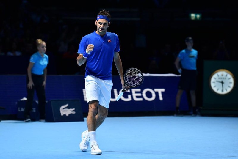  Switzerlands Roger Federer celebrates beating South Africas Kevin Anderson in their mens singles round-robin match on day five of the ATP World Tour Finals tennis tournament at the O2 Arena in London on November 15, 2018. (Photo by Glyn KIRK / AFP)Editoria: SPOLocal: LondonIndexador: GLYN KIRKSecao: tennisFonte: AFPFotógrafo: STR
