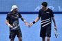  Polands Lukasz Kubot and Brazils Marcelo Melo celebrate a point against Croatias Mate Pavic and Austrias Oliver Marach in their mens doubles round-robin match on day six of the ATP World Tour Finals tennis tournament at the O2 Arena in London on November 16, 2018. (Photo by Glyn KIRK / AFP)Editoria: SPOLocal: LondonIndexador: GLYN KIRKSecao: tennisFonte: AFPFotógrafo: STR
