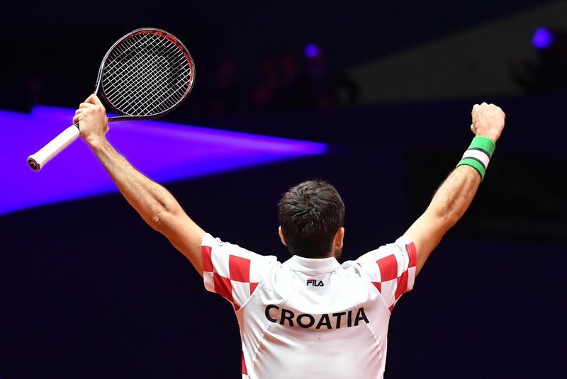  Croatias Marin Cilic celebrates after victory in his singles rubber against Frances Jo-Wilfried Tsonga during the Davis Cup final tennis match between France and Croatia at The Pierry-Mauroy Stadium at Villeneuve dAscq in northern France on November 23, 2018. (Photo by PHILIPPE HUGUEN / AFP)Editoria: SPOLocal: Villeneuve-dAscqIndexador: PHILIPPE HUGUENSecao: tennisFonte: AFPFotógrafo: STF