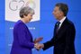  Britains Prime Minister Theresa May (L) is welcomed by Argentinas President Mauricio Macri at Costa Salguero in Buenos Aires during the G20 Leaders Summit, on November 30, 2018. - G20 powers open two days of summit talks on Friday after a stormy buildup dominated by tensions with Russia and US President Donald Trumps combative stance on trade and climate fears. (Photo by Alexander NEMENOV / AFP)Editoria: POLLocal: Buenos AiresIndexador: ALEXANDER NEMENOVSecao: diplomacyFonte: AFPFotógrafo: STF