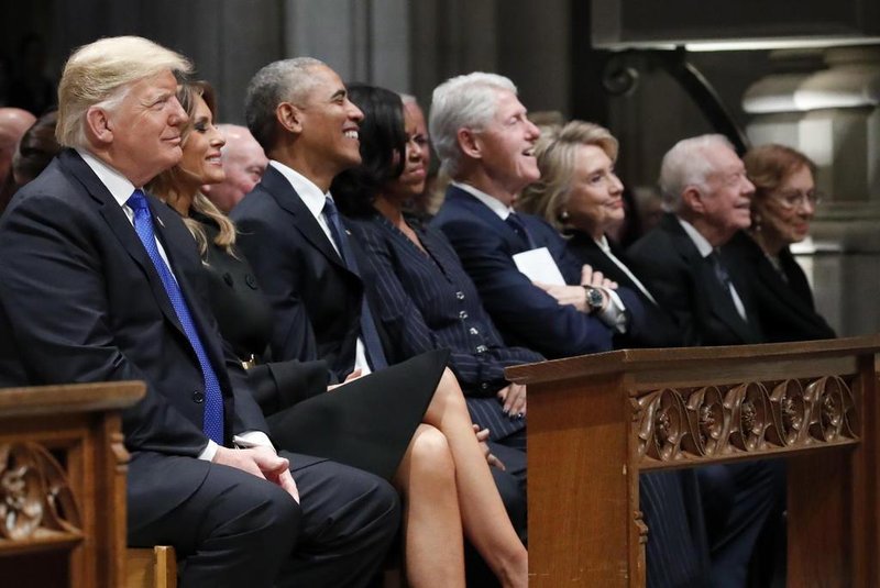  From left, President Donald Trump, first lady Melania Trump, former President Barack Obama, former first lady Michelle Obama, former President Bill Clinton, former Secretary of State Hillary Clinton, and former President Jimmy Carter and former first lady Rosalynn Carter participate in the State Funeral for former President George H.W. Bush, at the National Cathedral, December 5, 2018 in Washington, DC. (Photo by Alex Brandon / POOL / AFP) / POOL PHOTOEditoria: POLLocal: WashingtonIndexador: ALEX BRANDONSecao: politics (general)Fonte: POOLFotógrafo: STR