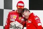 (FILES) Photo taken on August15, 2004 shows German Ferrari driver Michael Schumacher (L) hug French Ferrari sporting manager Jean Todt on the podium of the Hungaroring racetrack after the Hungarian Grand Prix in Budapest, Hungary. Seven-time world champion Michael Schumacher confirmed on October 4, 2012 that he will retire for the second time at the end of 2012.  AFP PHOTO JEAN-LOUP GAUTREAU