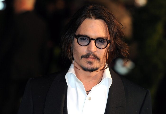 Johnny Depp perde em julgamento contra tabloide que o acusou de