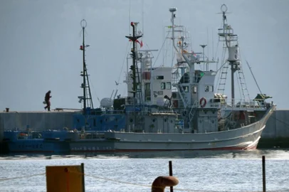 (FILES) In this file photo taken on April 25, 2014 Japanese whaling ships are anchored at Ayukawa port in Ishinomaki. - Japan said on December 26 it is withdrawing from the International Whaling Commission and will resume commercial whaling next year, sparking criticism from activists and anti-whaling countries including Australia. (Photo by Kazuhiro NOGI / AFP)