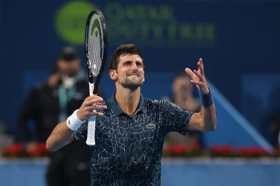 Novak Djokovic of Serbia reacts after winning against Marton Fucsovics of Hungary in the ATP Qatar Open tennis second round match in Doha on January 2, 2019. (Photo by KARIM JAAFAR / AFP)