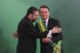  Brazils new President Jair Bolsonaro (R) congratulates Brazils new Foreign Minister Ernesto Araujo during the swearing-in ceremony of his cabinet at Planalto Palace in Brasilia on January 1, 2019 after his own inauguration ceremony at the National Congress. - Bolsonaro takes office with promises to radically change the path taken by Latin Americas biggest country by trashing decades of centre-left policies. (Photo by Sergio LIMA / AFP)Editoria: POLLocal: BrasíliaIndexador: SERGIO LIMASecao: governmentFonte: AFPFotógrafo: STR